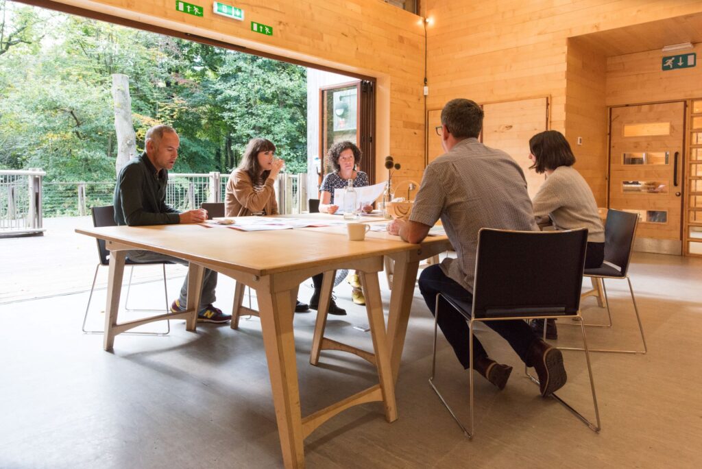 Sycamore clad training room with views overlooking the woods